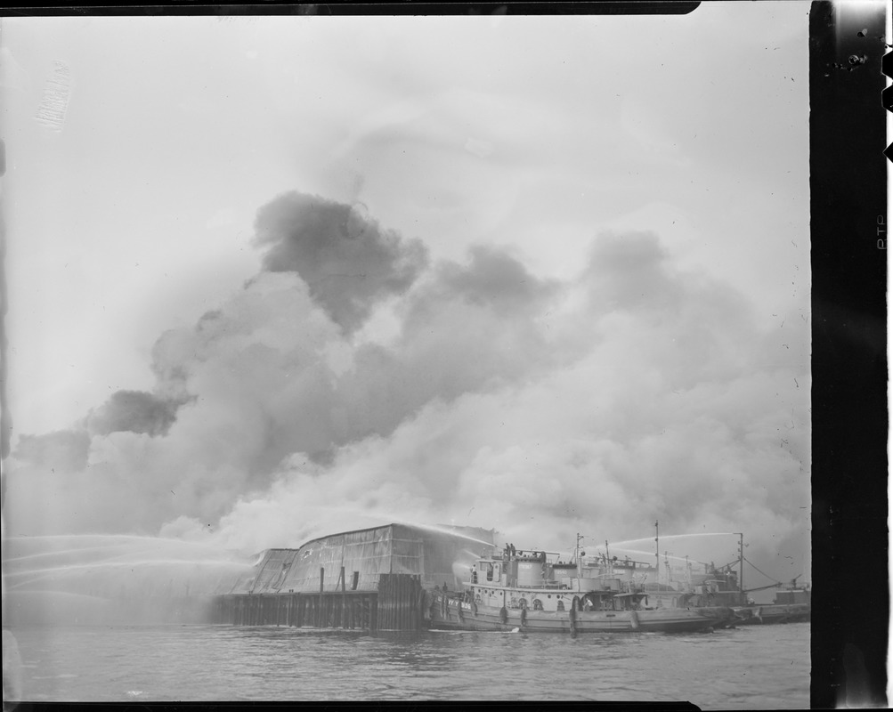 Fireboats fight wharf fire