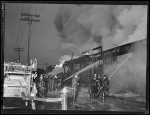 Lumber yard burns in Medford