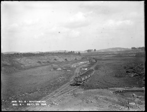 Sudbury Reservoir, excavation, track and train in Section K, east of road, from the southwest in road near subway bridge, Southborough, Mass., Sep. 25, 1896