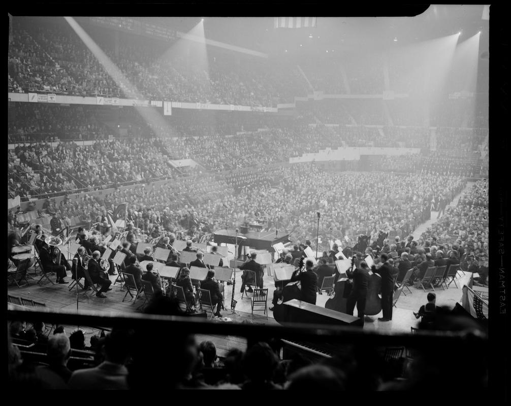 View of orchestra and crowd during Greater Boston United War Fund rally at Boston Garden
