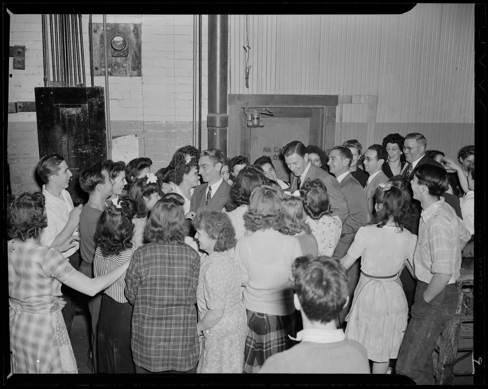 George Murphy touring the Converse Rubber Company in Malden as part of Sixth War Loan visit