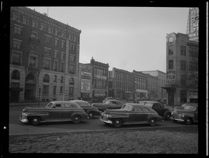 Street scene with Yankee Network letter board sign advertising Six Bells on WNAC sponsored by H. P. Hood and Sons