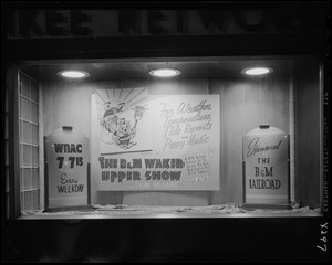 Window display advertising B&M Waker-upper Show on WNAC sponsored by The B & M Railroad