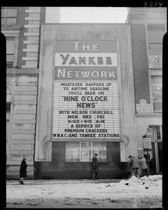 Yankee Network letter board sign advertising Nine O'Clock News with Nelson Churchill on WNAC sponsored by Premium Crackers