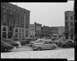 Street scene with Yankee Network letter board sign advertising San Quentin