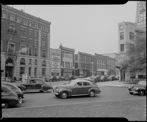 Street scene with Yankee Network letter board sign advertising Boston Red Sox and Boston Braves games on WNAC sponsored by Atlantic Hi-arc and Narragansett Brewing Co.