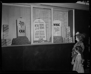 Window display for Yankee Network News Service with Verne Williams on WNAC sponsored by Crax
