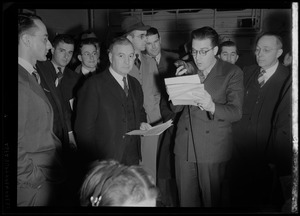 Horace T. Cahill with Russell Offhaus of WCOP reporting from crowd