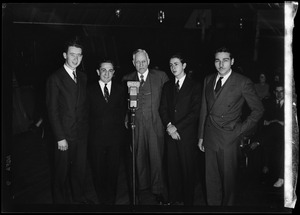 Group of men at WCOP microphone