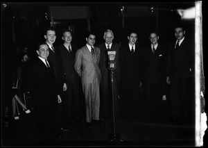 Group of men at WCOP microphone