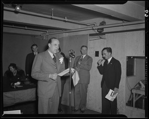 Man speaking into WRUL microphone