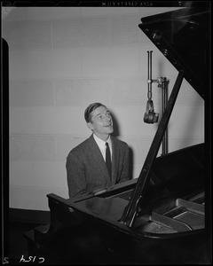 Unidentified man, possibly Art Amadon, at piano