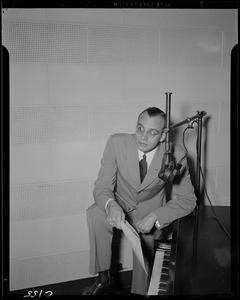 Unidentified man at piano