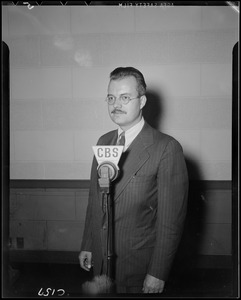 Unidentified man at microphone