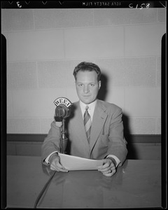 Unidentified man at microphone