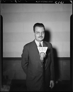 Unidentified man at microphone