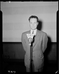 Unidentified man at microphone