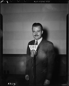 Unidentified man at microphone