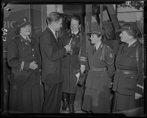 Jay Wesley of WEEI interviews Col. Natalie Hays Hammond with Capt. Mary A. Tucker and other members of the Civic Patrol of America