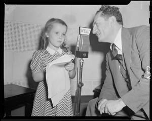 Man and girl at WEEI microphone