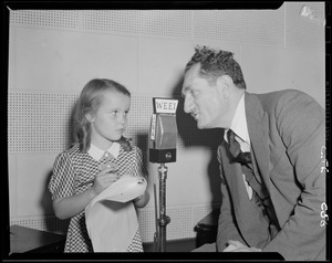 Man and girl at WEEI microphone