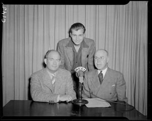 Louis Brems, Jay Wesley, and an unidentified man at WEEI microphone