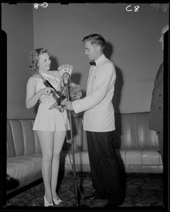 Miss Massachusetts, Betsy Taylor, presented trophy by WEEI's Jay Wesley