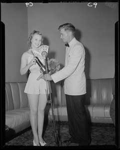 Miss Massachusetts, Betsy Taylor, presented trophy by WEEI's Jay Wesley