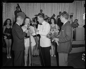 Miss Massachusetts, Betsy Taylor, with Louis Brems, Jay Wesley, and Lloyd G. del Castillo