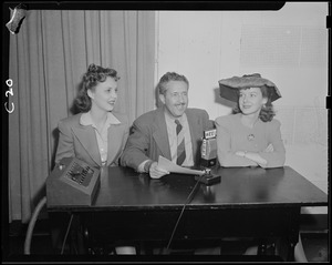 Miss Massachusetts Betsy Taylor and unidentified movie actress, with Lloyd G. del Castillo