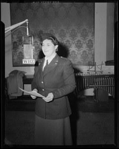 Woman in uniform at WBZ microphone