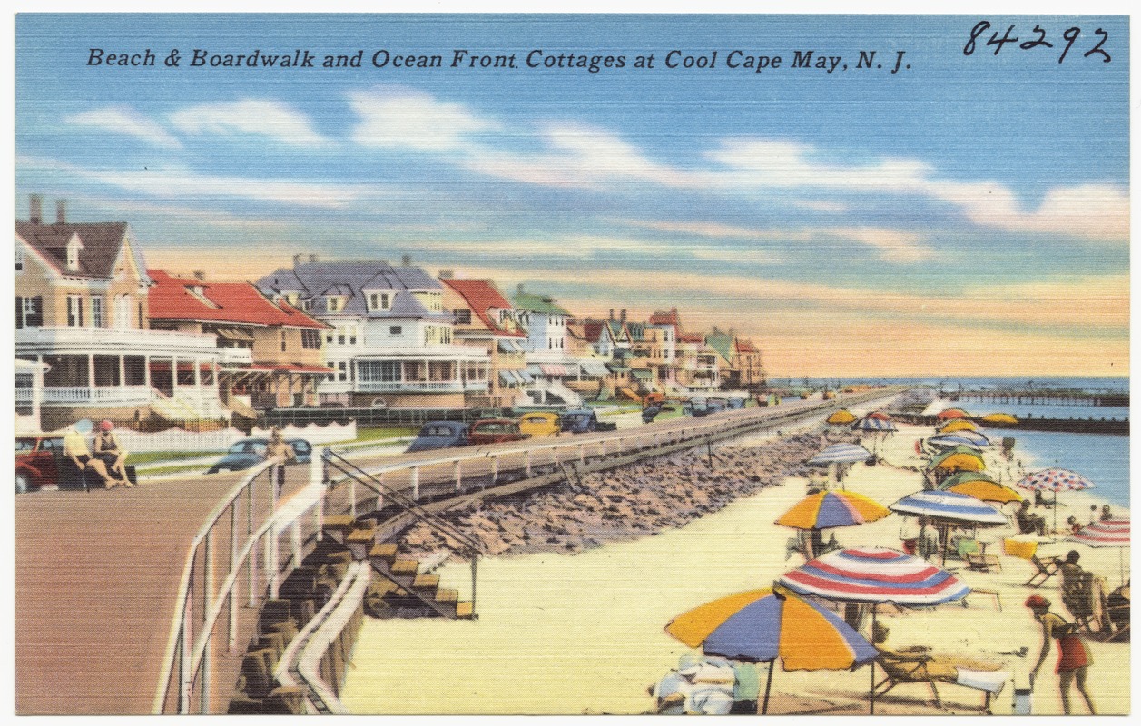 Beach & boardwalk and ocean front cottages at cool Cape May, N. J