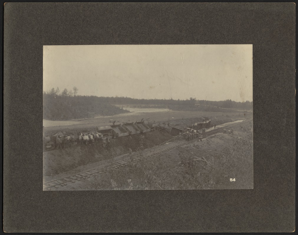 Wachusett Reservoir, train cars dumping soil, Print No. 54, Mass., ca. 1899