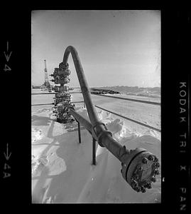 BP Alaska oil pipe, derrick in background