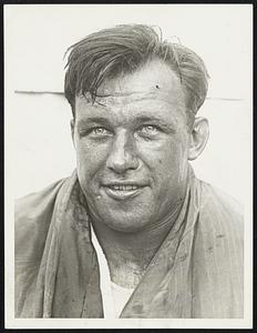 Sharkey Looks Like Business. Lots of sweat, but feeling tip-top. This is the way Jack Sharkey looked after a stiff training session at his camp in Miami Beach, Fla., where he is preparing for his fight with Phil Scott Feb. 27.