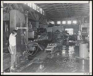 Six feet of water inundated machine tools and heavy castings at Reed-Prentice.