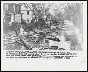 Ione Wreckage-Wreckage of houses blown down by hurricane Ione and washed about by flood water, clutter the streets near the water front here yesterday. Property damages are estimated to run into the millions of dollars.