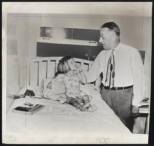 Serum-Aided Polio Victim-Peggy Ann Best, 4, of Tucumcari, N. M., smiles at her grandfather, Dr. C. O. Molander, Chicago, who gave her a special serum Friday to lessen severity of polio. She apparently is recovering in Lubbock, Tex., hospital. The serum, said to be in use 10 to 15 years, was used after Peggy's sister, Sandra, 7, had died of polio.