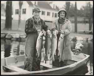 Singing in the Rain at New Hampshire’s Lake Sunapee this week were the Pouliot brothers of Manchester, Severin and Leo, after catching these four lake trout totaling 35 pounds in weight.