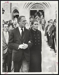 Mayor and Mrs. White leave funeral of John J. Labanare, slain campaign aide. Story. Sect. 2, Page 7.