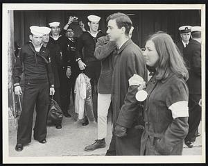 Marches pass sailors at Army base