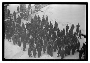 A group of people outside in the snow