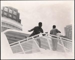 Young men on top deck of a ship