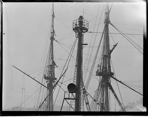 Two kinds of masts. Background: USS Constitution. Foreground: Lightship Nantucket