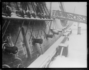 Snow covered frigate USS Constitution in Navy Yard