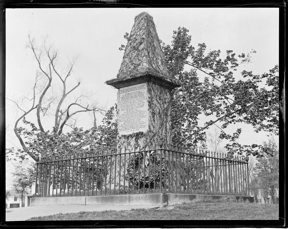 Lexington monument covered with vines