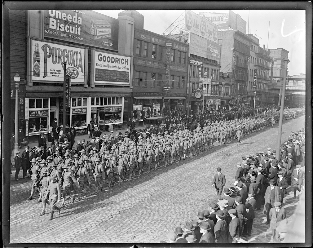 Eights Regiment arrives from the Mexican border. Parading near North Station, Canal St., Boston.