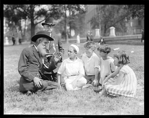 G.A.R. vets P.R. Barker and John Houder from Fitzgerald, Georgia, tell war stories to kids on historic Boston Common