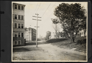 View looking west on Pearl Street toward railroad crossing showing section of Slater-Morrill Shoe Factory on left.