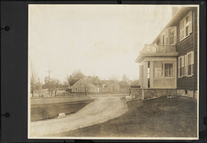 View looking south of Bartlett house entrance and Johnson house.